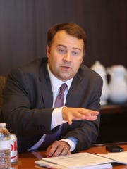 David Pepper, then a candidate for Ohio attorney general, speaks with The Enquirer’s editorial board on October 2, 2014. The Enquirer/Leigh Taylor